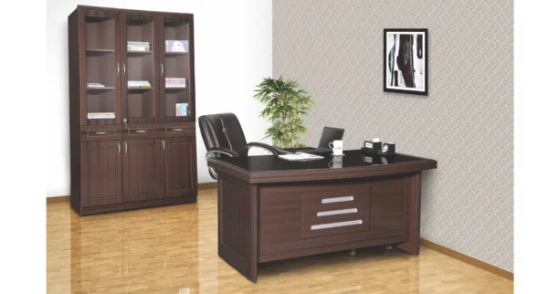 An organized and stylish home office setup featuring a wooden office table with a built-in bookcase.